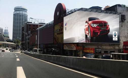 武漢市解放大道歡樂迪墻面三面翻廣告媒體廣告報價